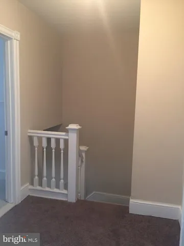 a view of entryway with stairs