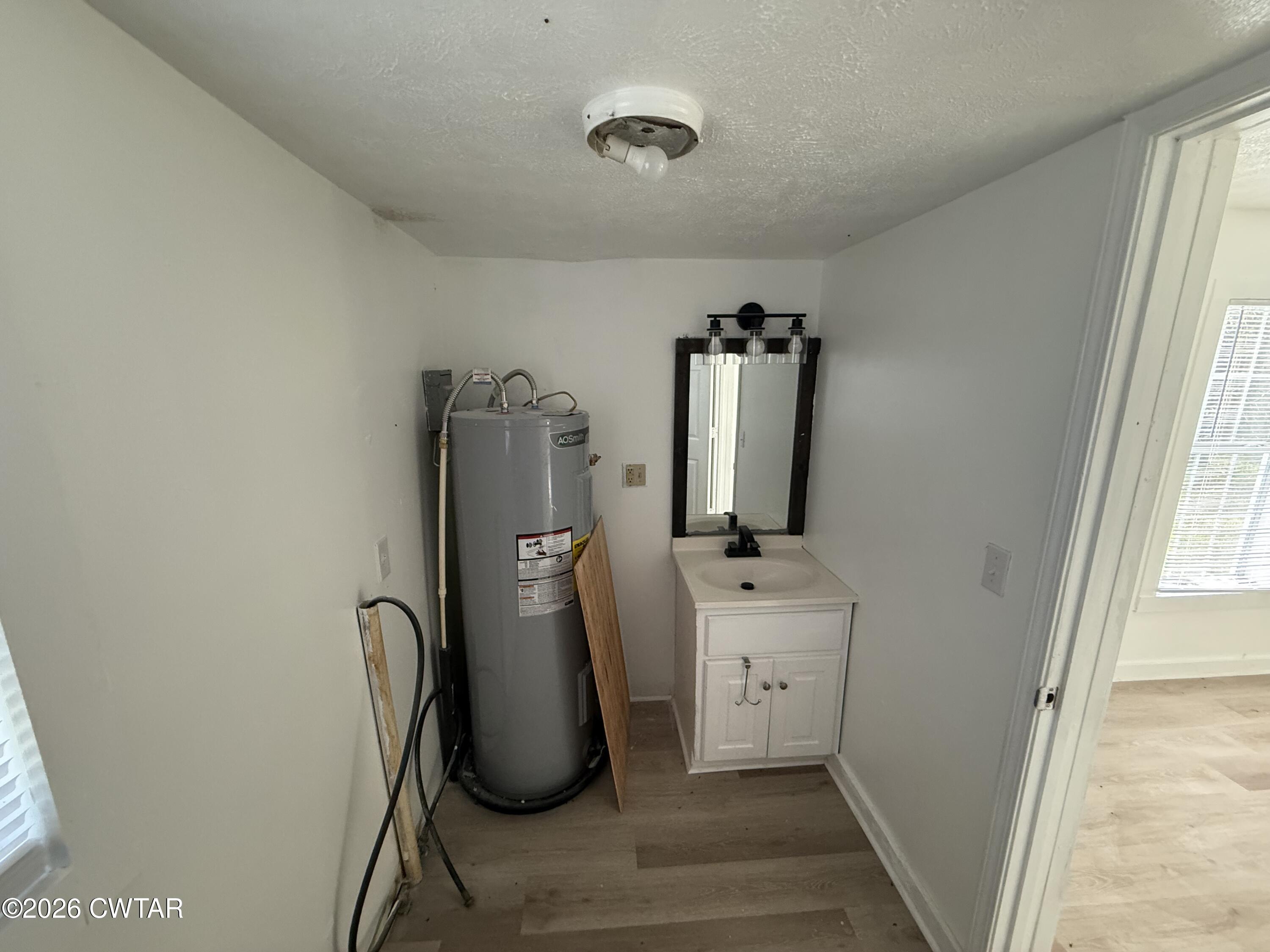 1907 Elmer Cox Road Bethel Springs, TN 38315 - Photo 7 of 20 Bathroom