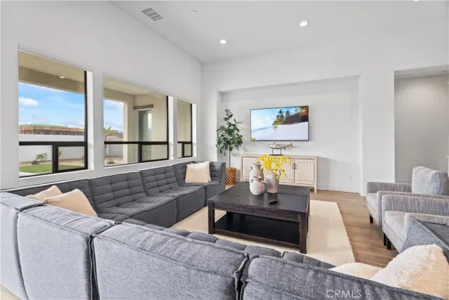 a spacious bathroom with a granite countertop sink mirror and