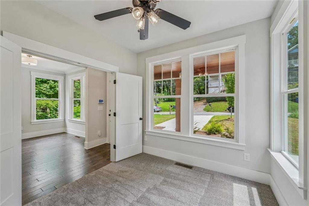 1179 Booker Avenue Southwest Atlanta, GA 30310 - Photo 23 of 54 an empty room with windows and entrance
