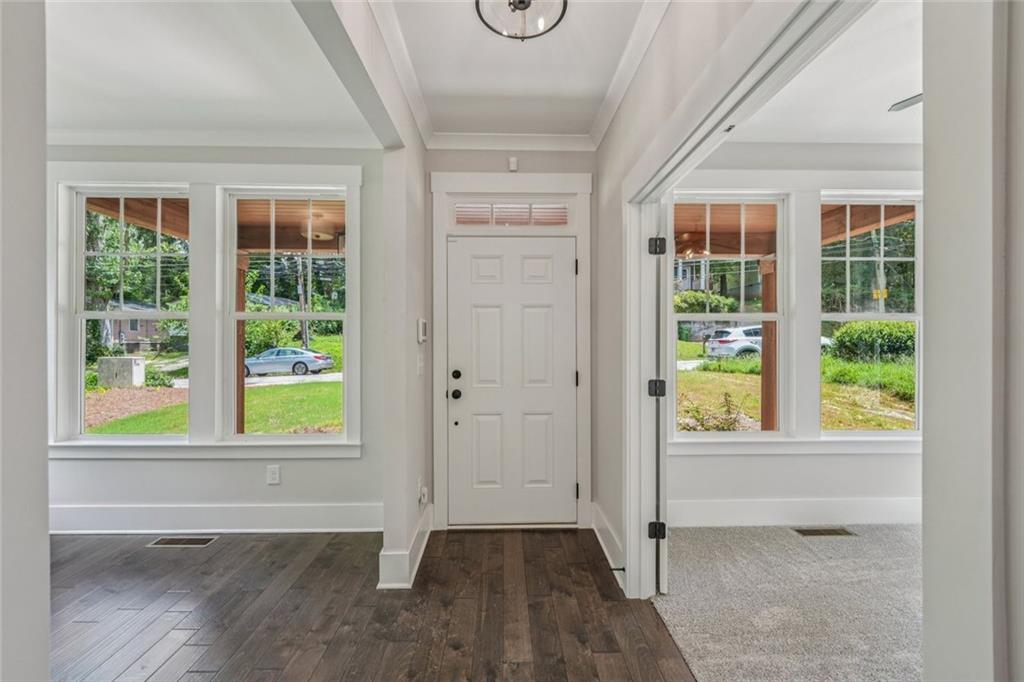 1179 Booker Avenue Southwest Atlanta, GA 30310 - Photo 42 of 54 a view of an entryway with wooden floor and door