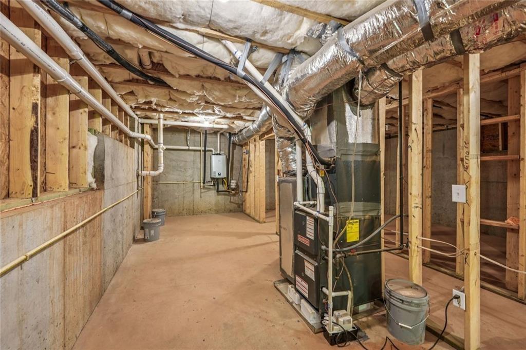 1179 Booker Avenue Southwest Atlanta, GA 30310 - Photo 46 of 54 a view of an empty room with wooden floor
