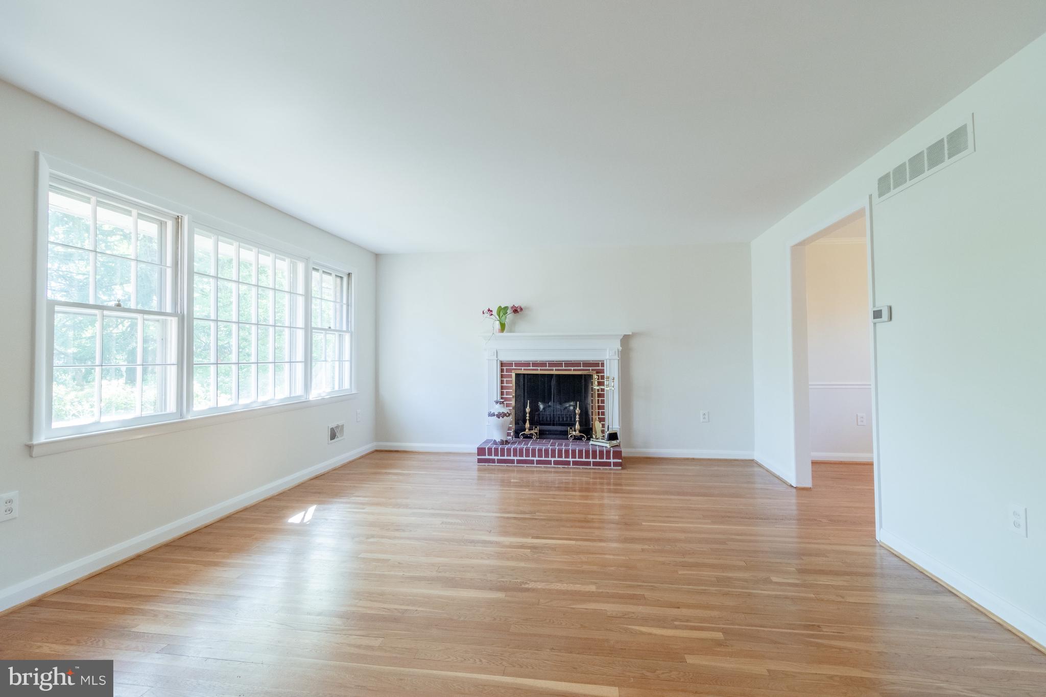 Living room with hardwood flrs and Fireplace