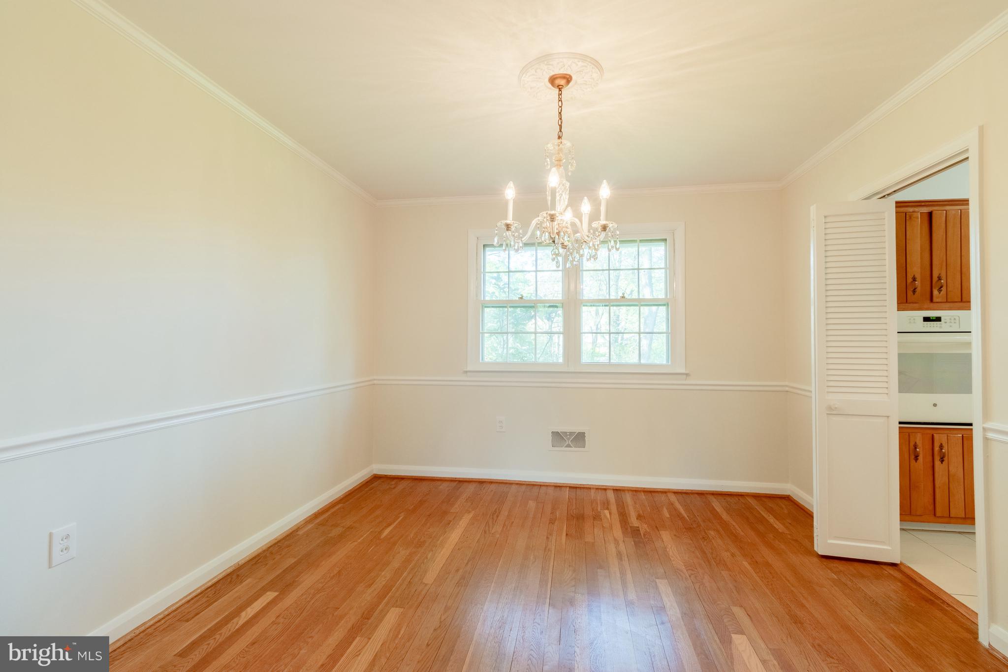 2408 Caney Road Wilmington, DE 19810 - Photo 8 of 25 Dining room with chair rail and crown molding