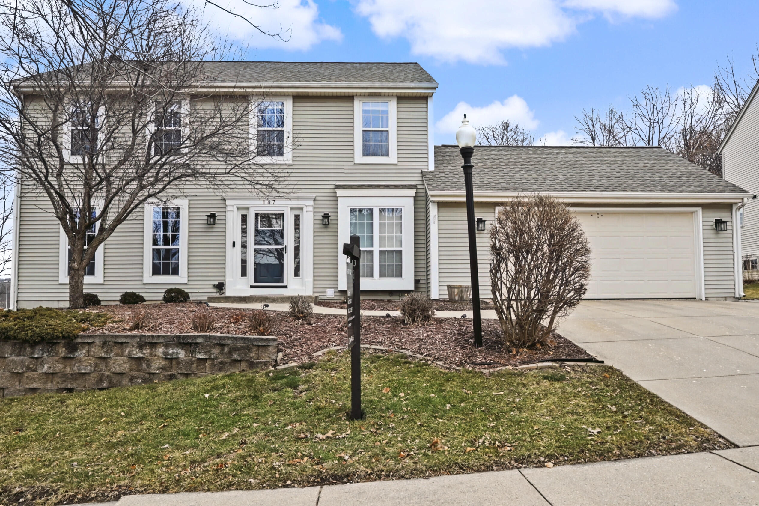 147 Manchester Drive Waukesha, WI 53188 - Photo 1 of 1 Front of home