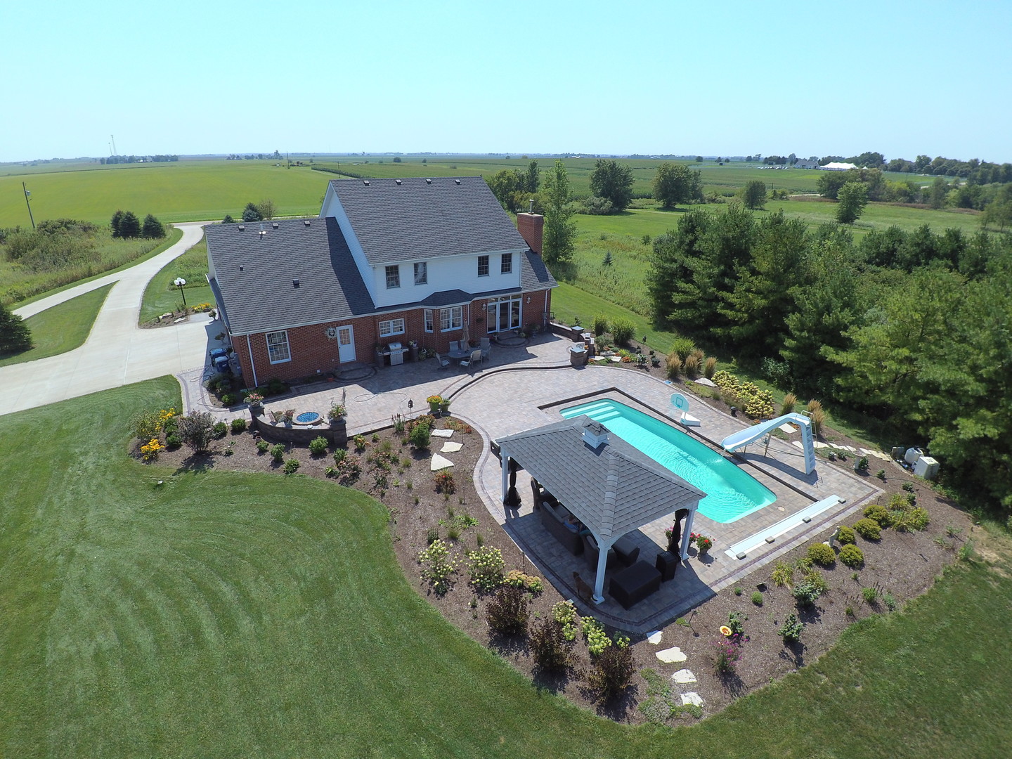 1651 Johnson Road Oswego, IL 60543 - Photo 45 of 60 an aerial view of a house with a garden