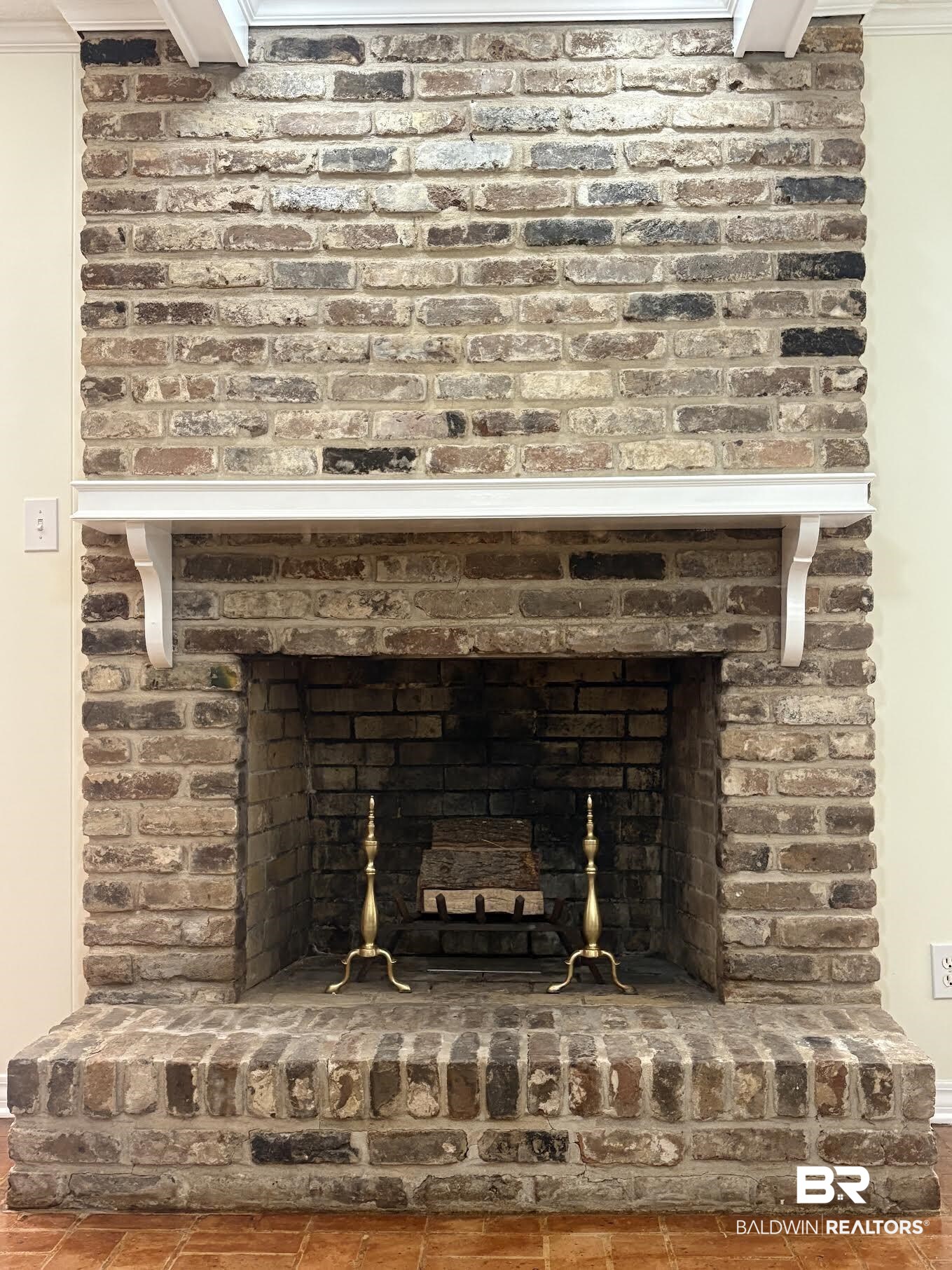 6105 Brandy Run Road South Mobile, AL 36608 - Photo 15 of 45 Detailed view of crown molding and a brick fireplace