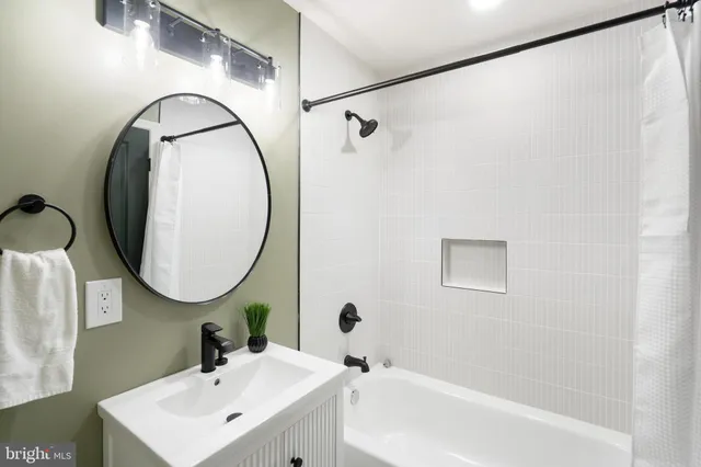 an aerial view of a house with garden space and street view