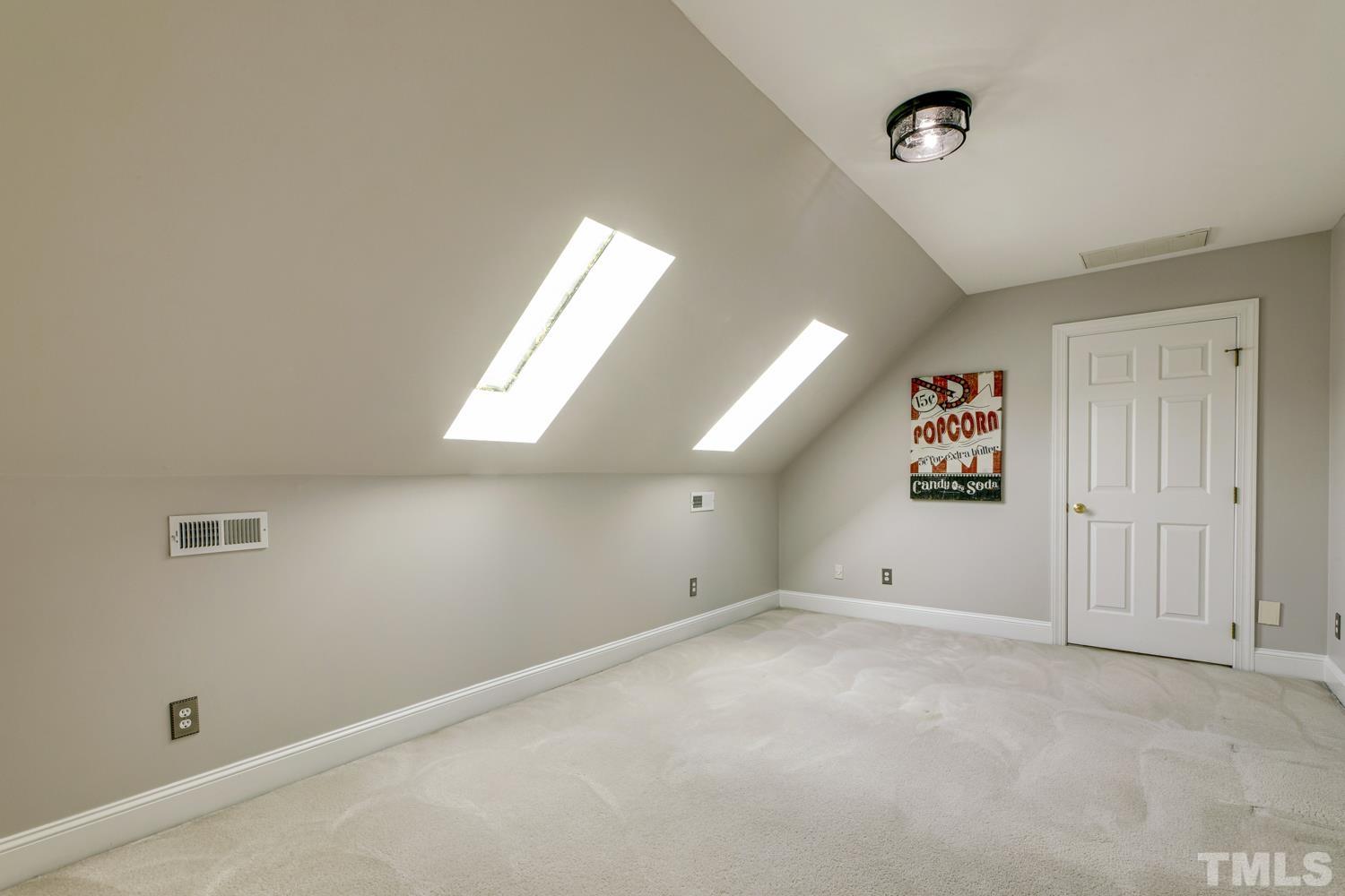 7705 Rainwater Road Raleigh, NC 27615 - Photo 9 of 18 a view of an empty room