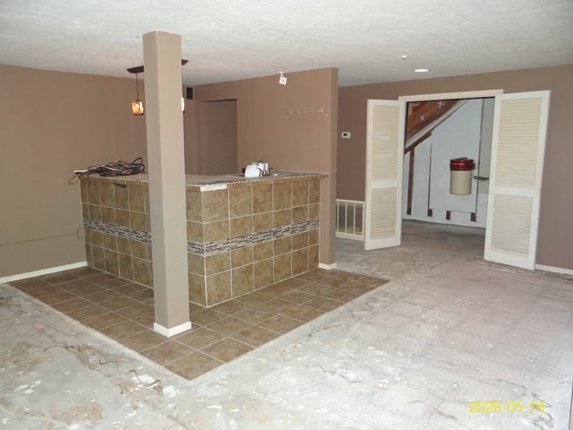 6730 Ranch Forest Drive Columbus, GA 31904 - Photo 15 of 17 a view of a hallway with wooden shelves