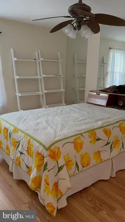 a bedroom with a bed and a closet