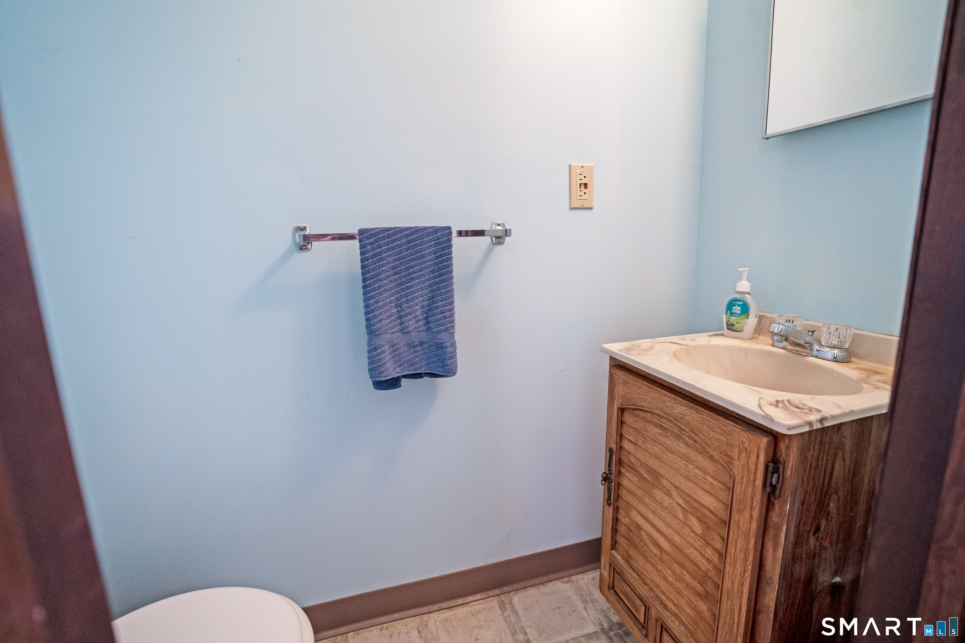 461 Spring Street, Unit 3B Naugatuck, CT 06770 - Photo 11 of 13 a bathroom with a sink and toilet