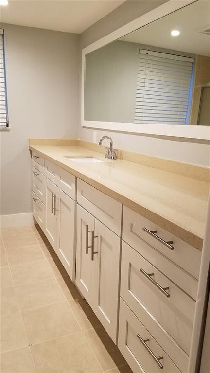 3100 North Course Lane, Unit 210 Pompano Beach, FL 33069 - Photo 20 of 28 a view of granite countertop cabinets