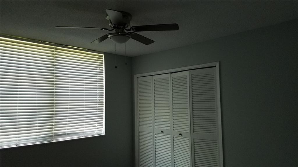 3100 North Course Lane, Unit 210 Pompano Beach, FL 33069 - Photo 25 of 28 a view of a room that has a window