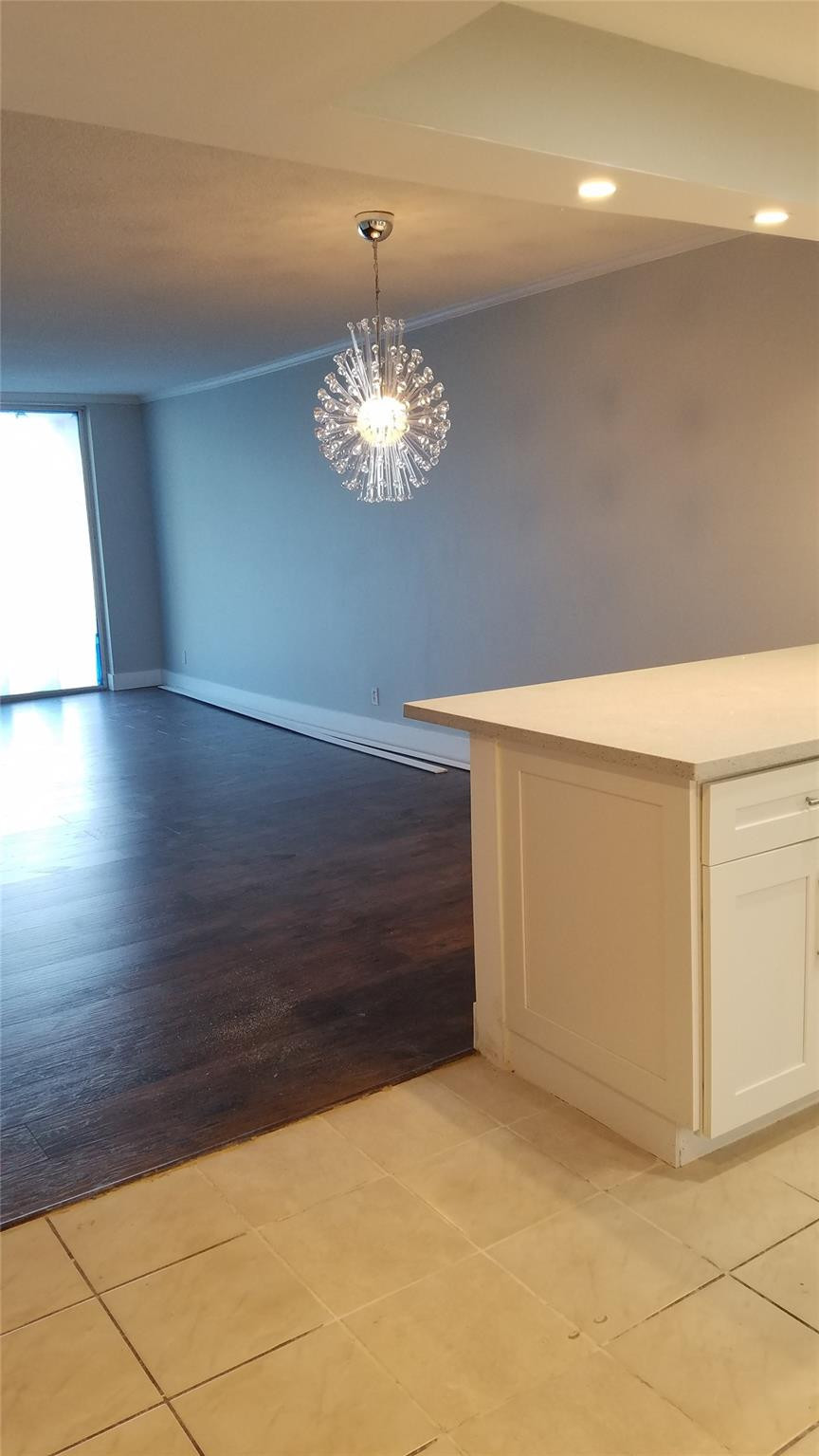 3100 North Course Lane, Unit 210 Pompano Beach, FL 33069 - Photo 6 of 28 a view of empty room with wooden floor