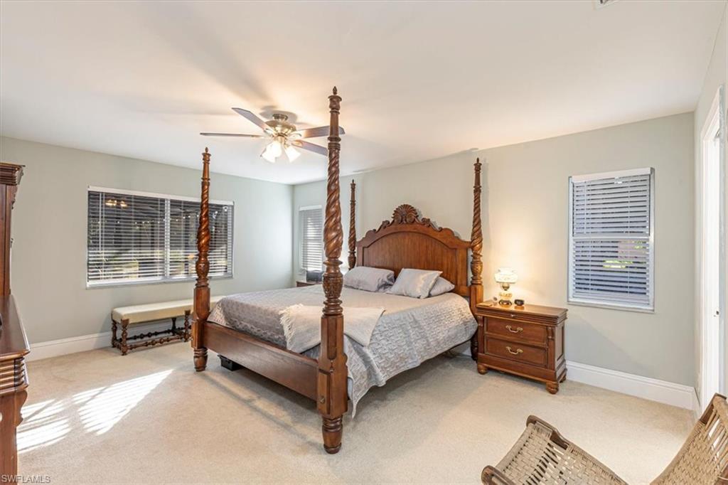 960 21st Street Southwest Naples, FL 34117 - Photo 14 of 33 a bedroom with a bed dresser and a window