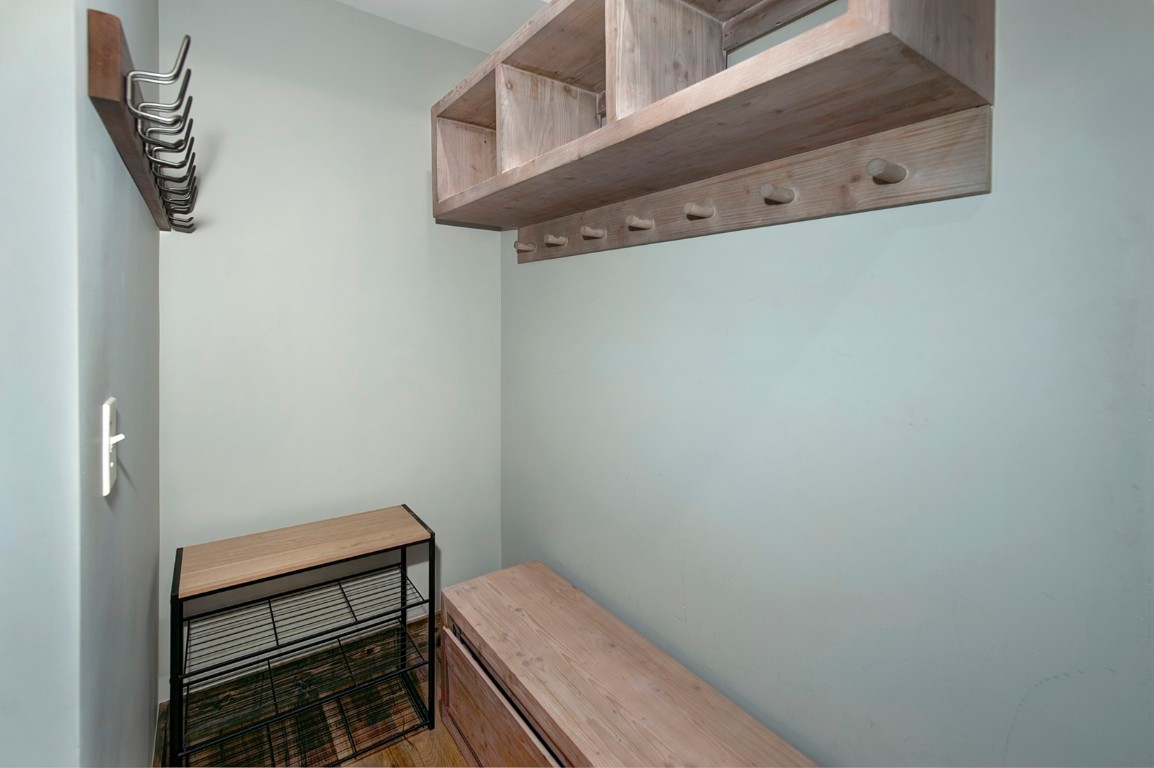 102 Lake Ridge Circle, Unit 1891 Keystone, CO 80435 - Photo 12 of 34 a view of a room with racks on the wall