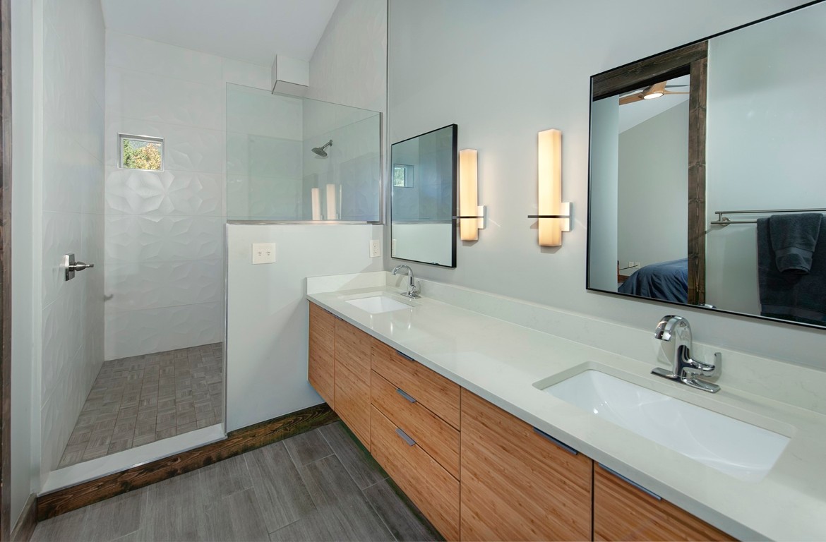 102 Lake Ridge Circle, Unit 1891 Keystone, CO 80435 - Photo 18 of 34 a bathroom with 2 sink and a mirror