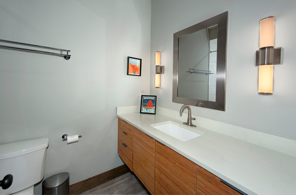 102 Lake Ridge Circle, Unit 1891 Keystone, CO 80435 - Photo 22 of 34 a bathroom with a sink and a mirror