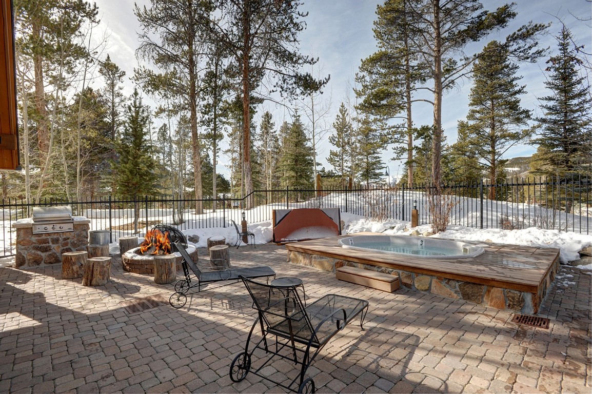 102 Lake Ridge Circle, Unit 1891 Keystone, CO 80435 - Photo 30 of 34 a view of a lake with outdoor seating