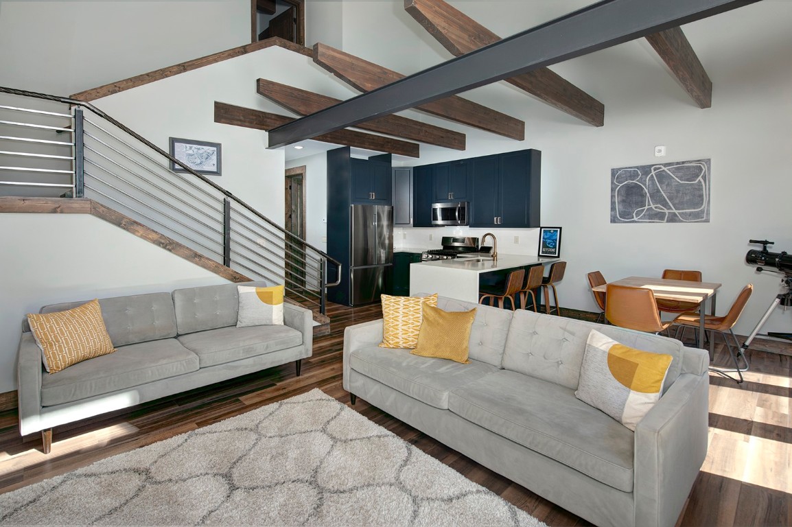 102 Lake Ridge Circle, Unit 1891 Keystone, CO 80435 - Photo 4 of 34 a living room with furniture and a view of kitchen