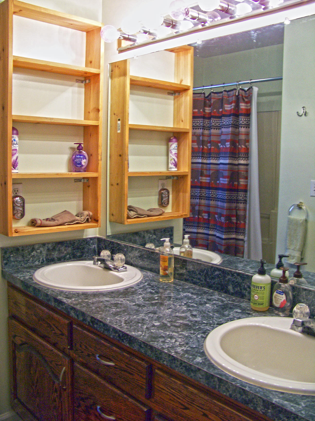 7039 Conner Road Northeast Copper Hill, VA 24079 - Photo 22 of 29 a bathroom with a sink and a mirror