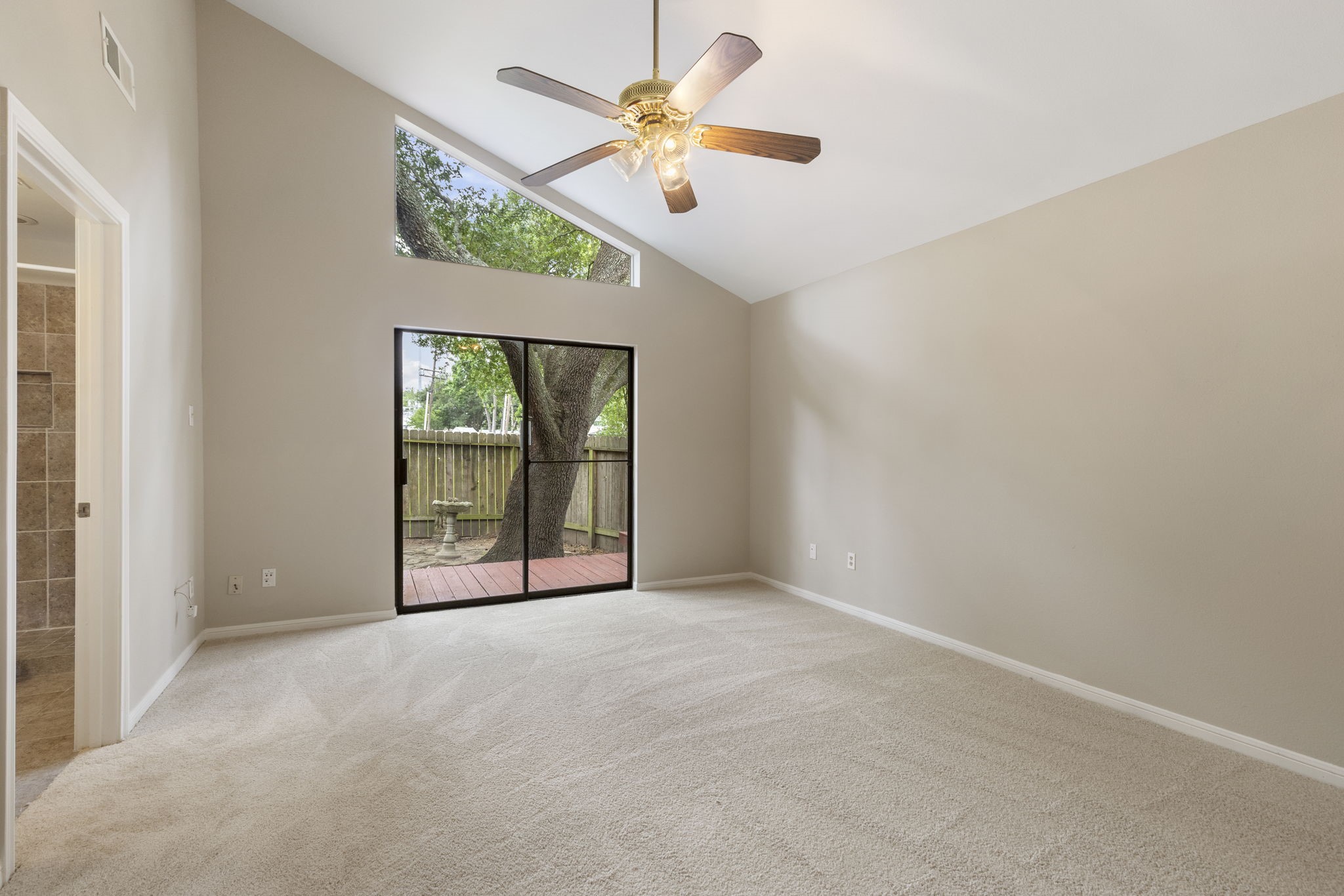49 April Village Conroe, TX 77356 - Photo 22 of 46 a view of an empty room with a window
