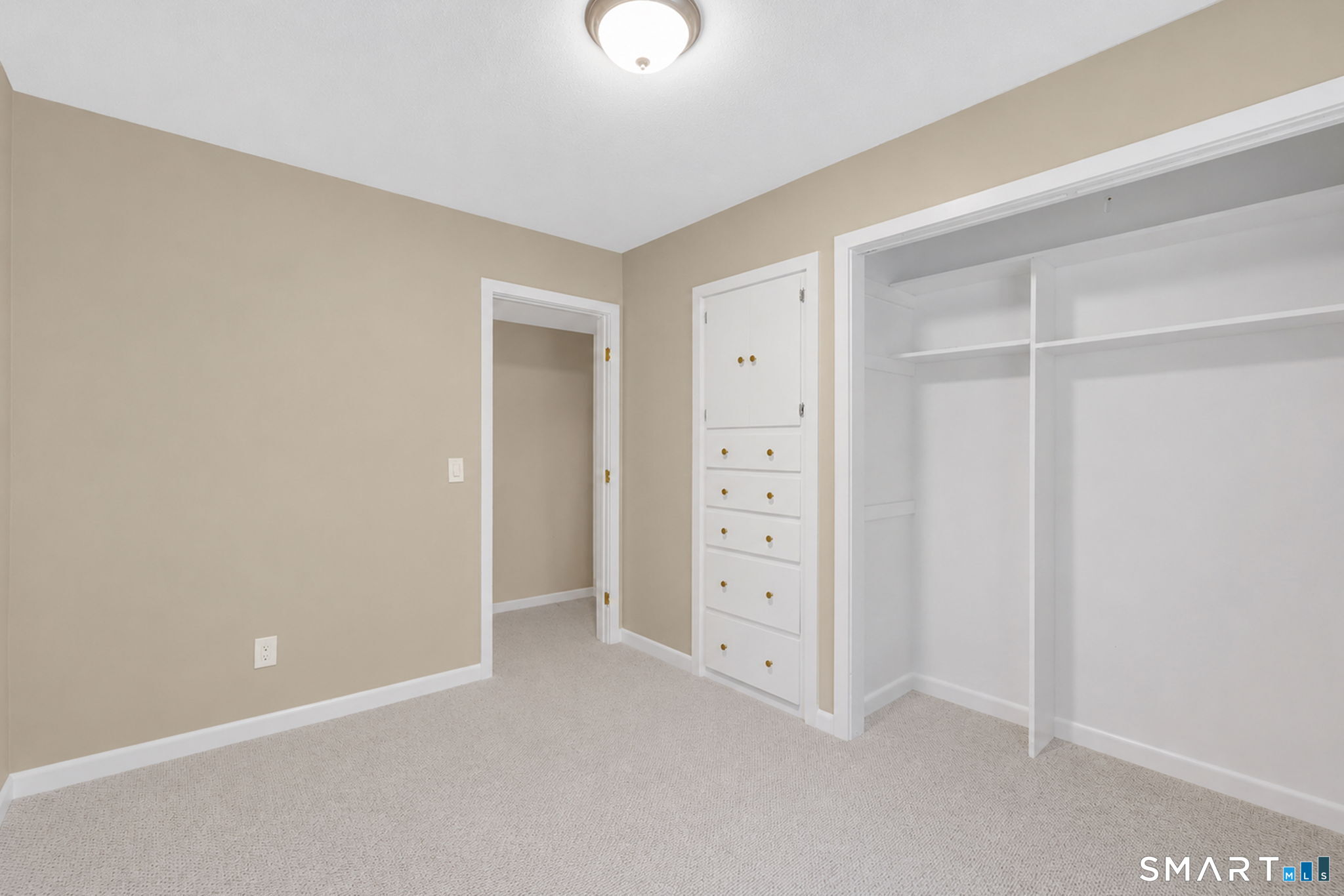49 Millstone Road Glastonbury, CT 06033 - Photo 23 of 39 wooden floor and cabinet in a room