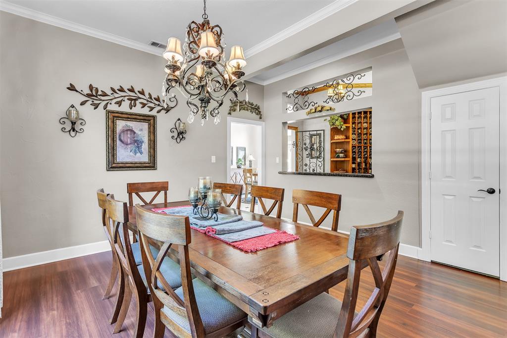 1 Darr Road Heath, TX 75032 - Photo 11 of 38 a view of a dining room with furniture window and wooden floor