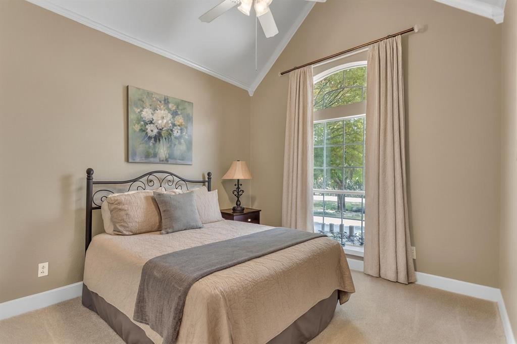 1 Darr Road Heath, TX 75032 - Photo 22 of 38 a bedroom with bed and a window