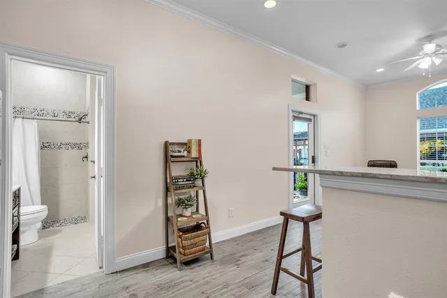 a living room with furniture and a window