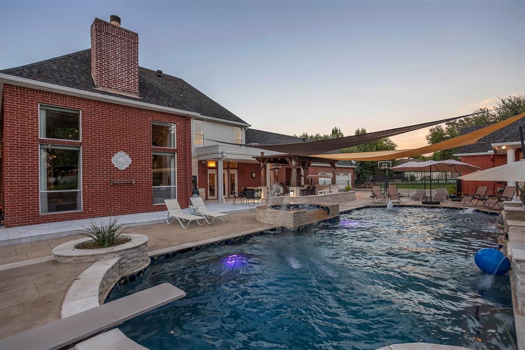 1 Darr Road Heath, TX 75032 - Photo 33 of 38 a front view of house with a garden