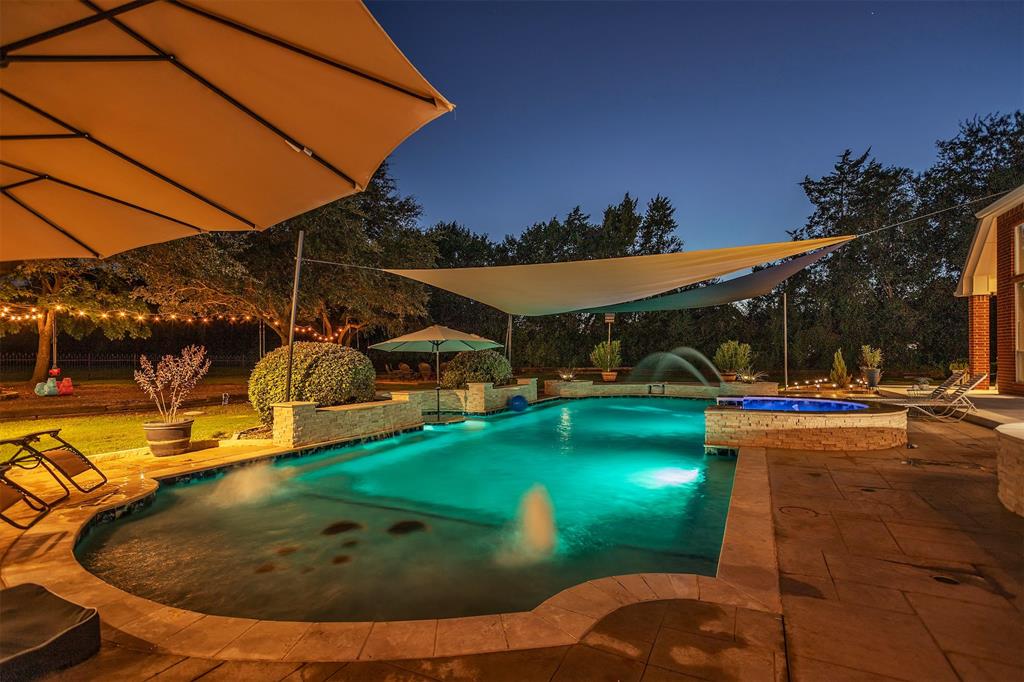 1 Darr Road Heath, TX 75032 - Photo 34 of 38 a view of a swimming pool with a yard