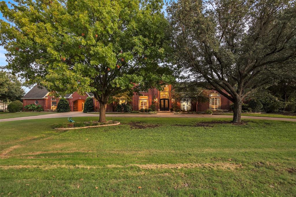 1 Darr Road Heath, TX 75032 - Photo 36 of 38 a building with trees in front of it