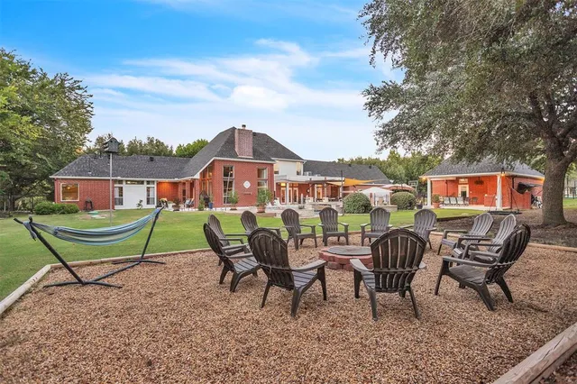 a view of a chairs and table in the terrace
