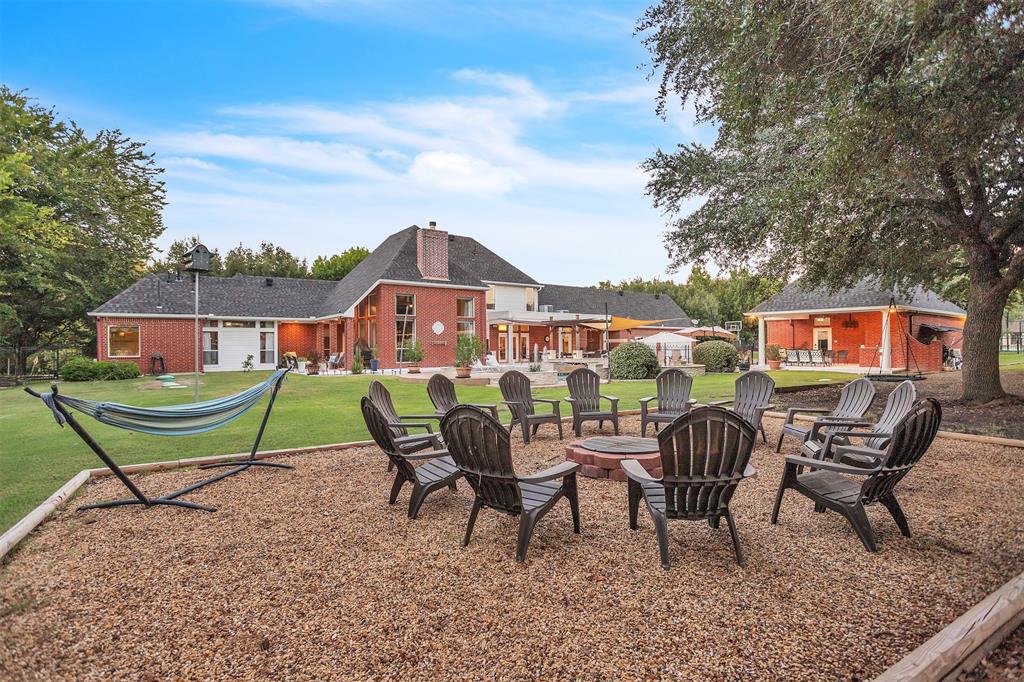 1 Darr Road Heath, TX 75032 - Photo 4 of 38 a view of a chairs and table in the terrace