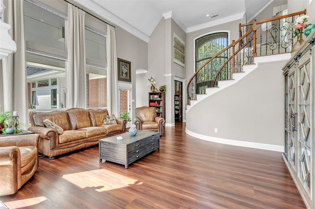 1 Darr Road Heath, TX 75032 - Photo 9 of 38 a living room with furniture and wooden floor
