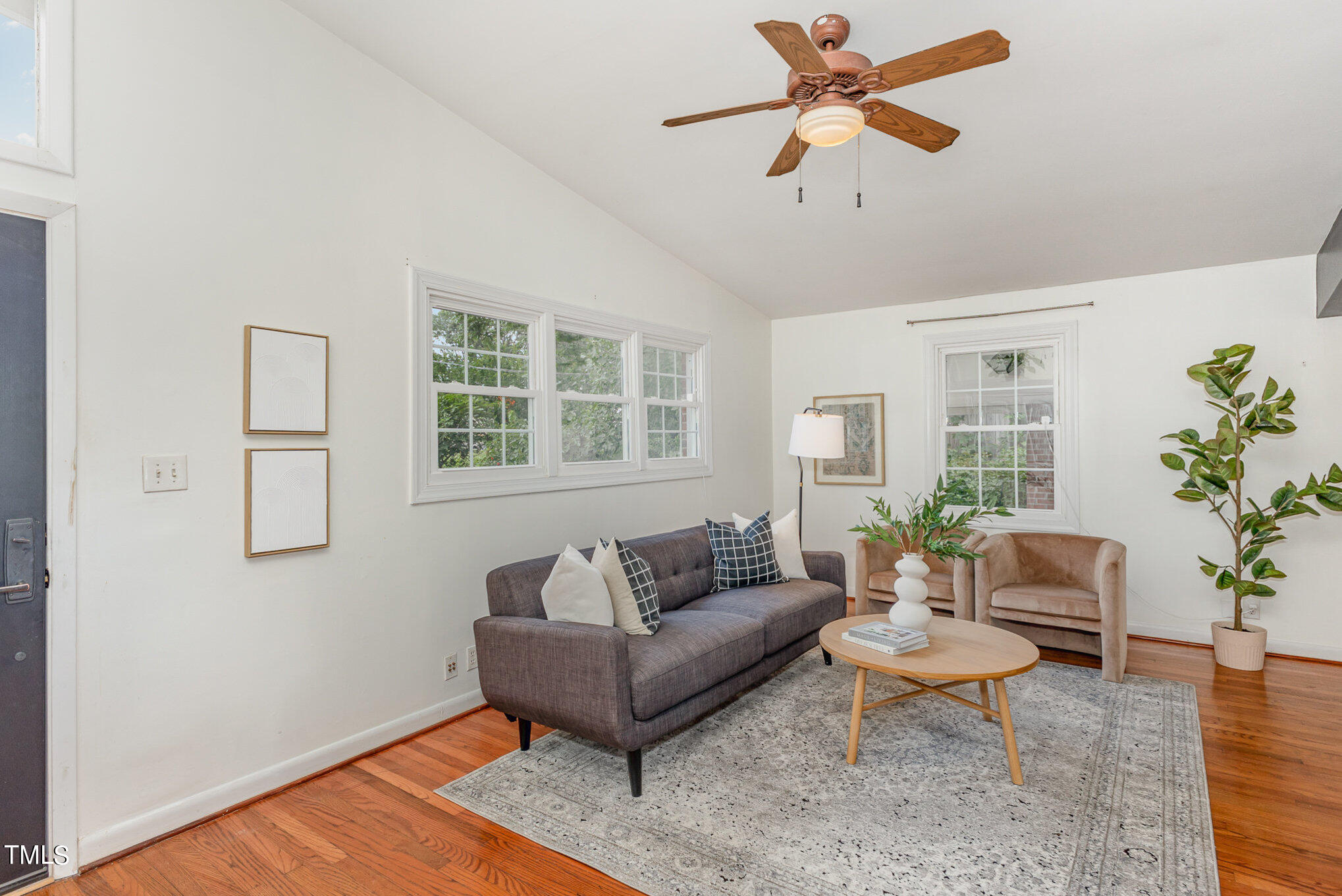 5125 Kaplan Drive Raleigh, NC 27606 - Photo 8 of 23 a living room with furniture and a window