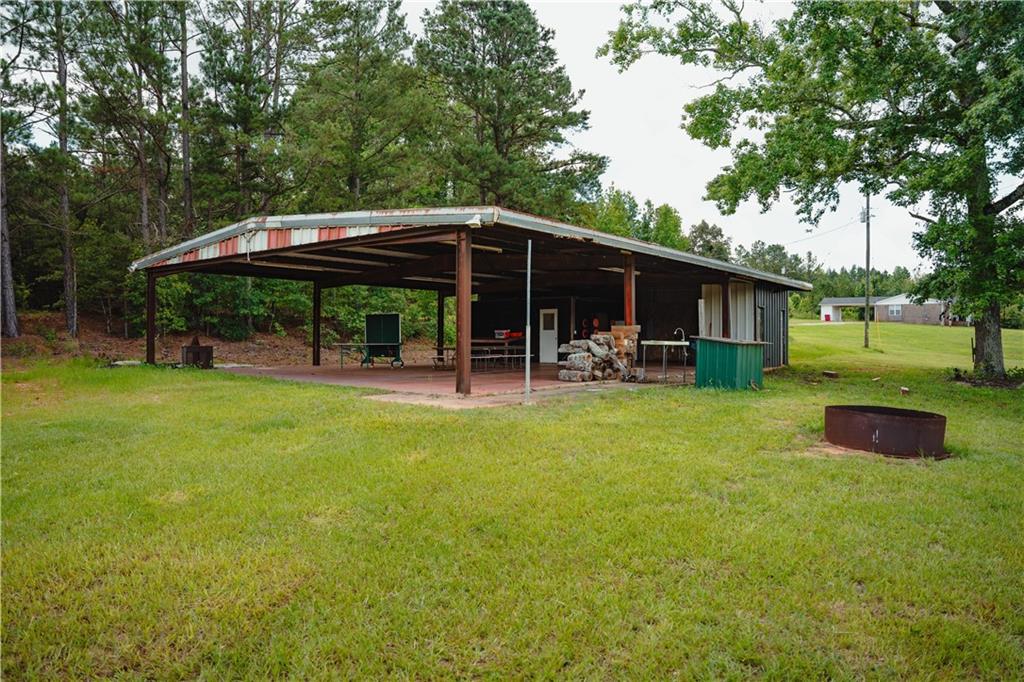 6938 Story Mill Road Hephzibah, GA 30815 - Photo 15 of 36 a view of outdoor space yard and patio