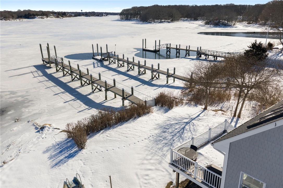 62 Flintstone Road Narragansett, RI 02882 - Photo 4 of 43 48 feet of salt water frontage on Champlin Cove in the Point Judith Pond. Views all the way to East Matunuck.