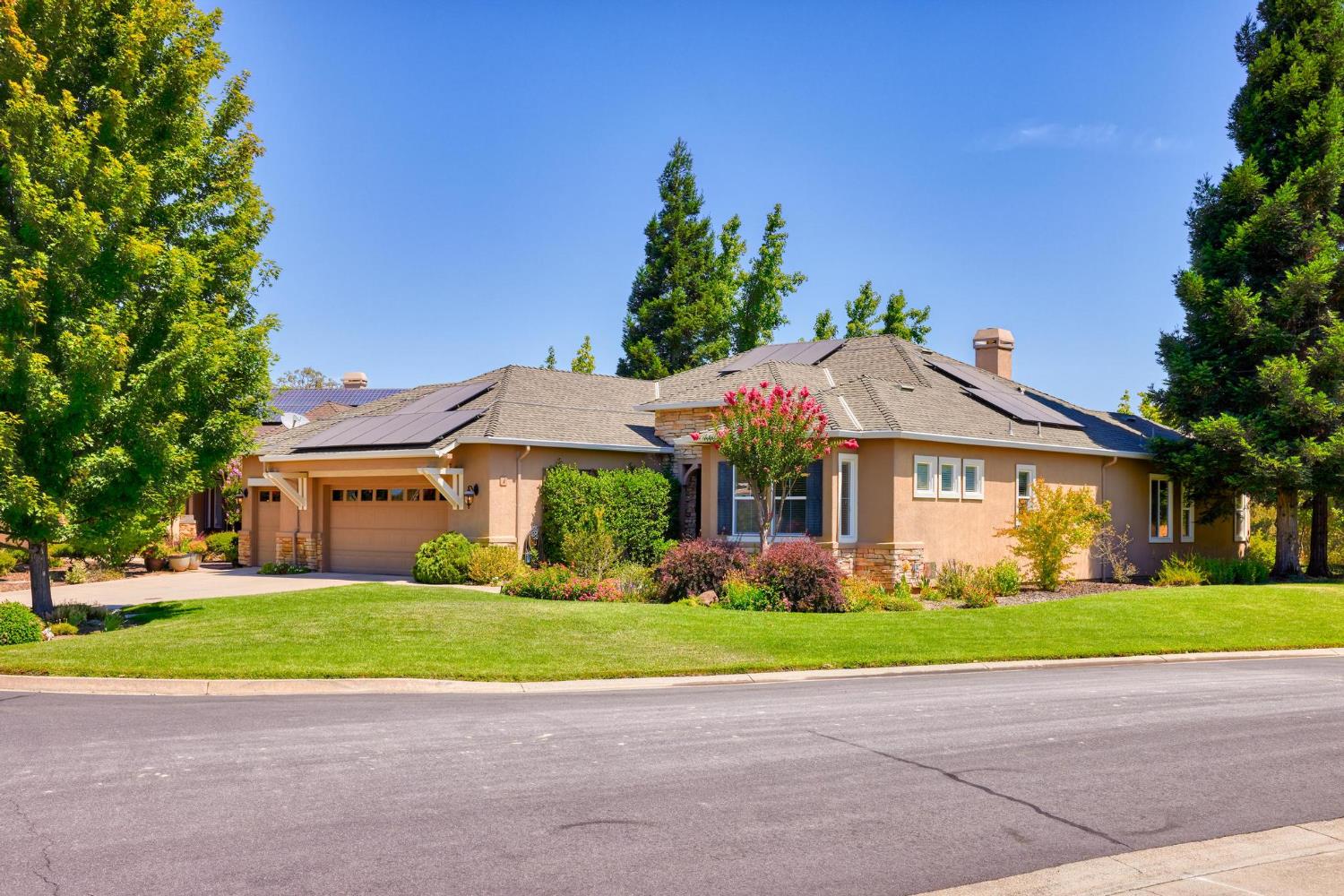 This beautiful home is located on a court and backs to open area.