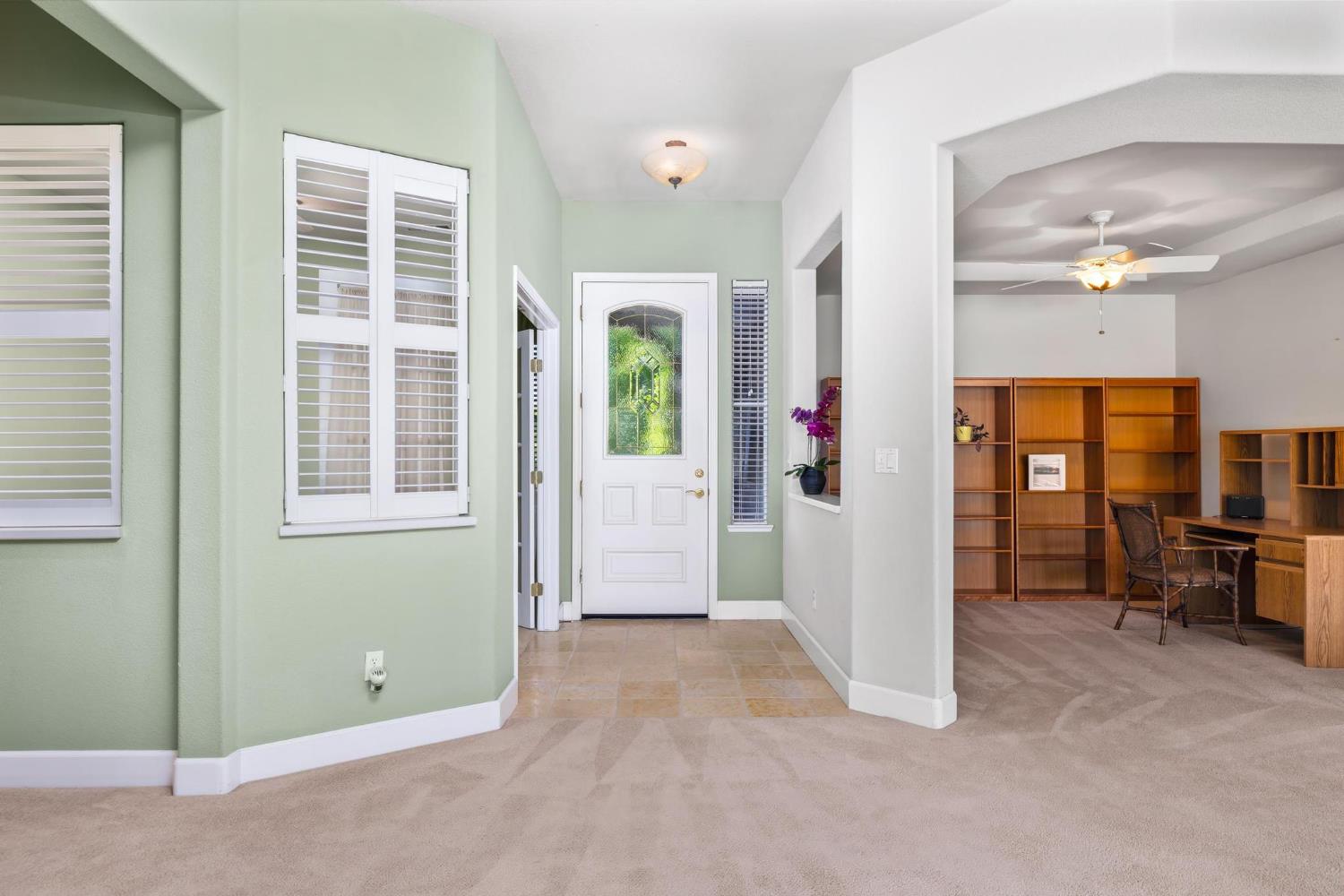 8 Rock Ridge Court, Unit 288 Copperopolis, CA 95228 - Photo 11 of 58 The room to the right on this photo was being used as a den. You could easily close this off for a private room or use as a dining room. The room to the left in this photo was being used as a 3rd bedroom.