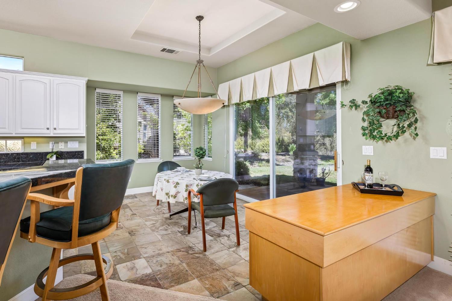 8 Rock Ridge Court, Unit 288 Copperopolis, CA 95228 - Photo 20 of 58 Breakfast nook with great backyard views and a sliding patio door.