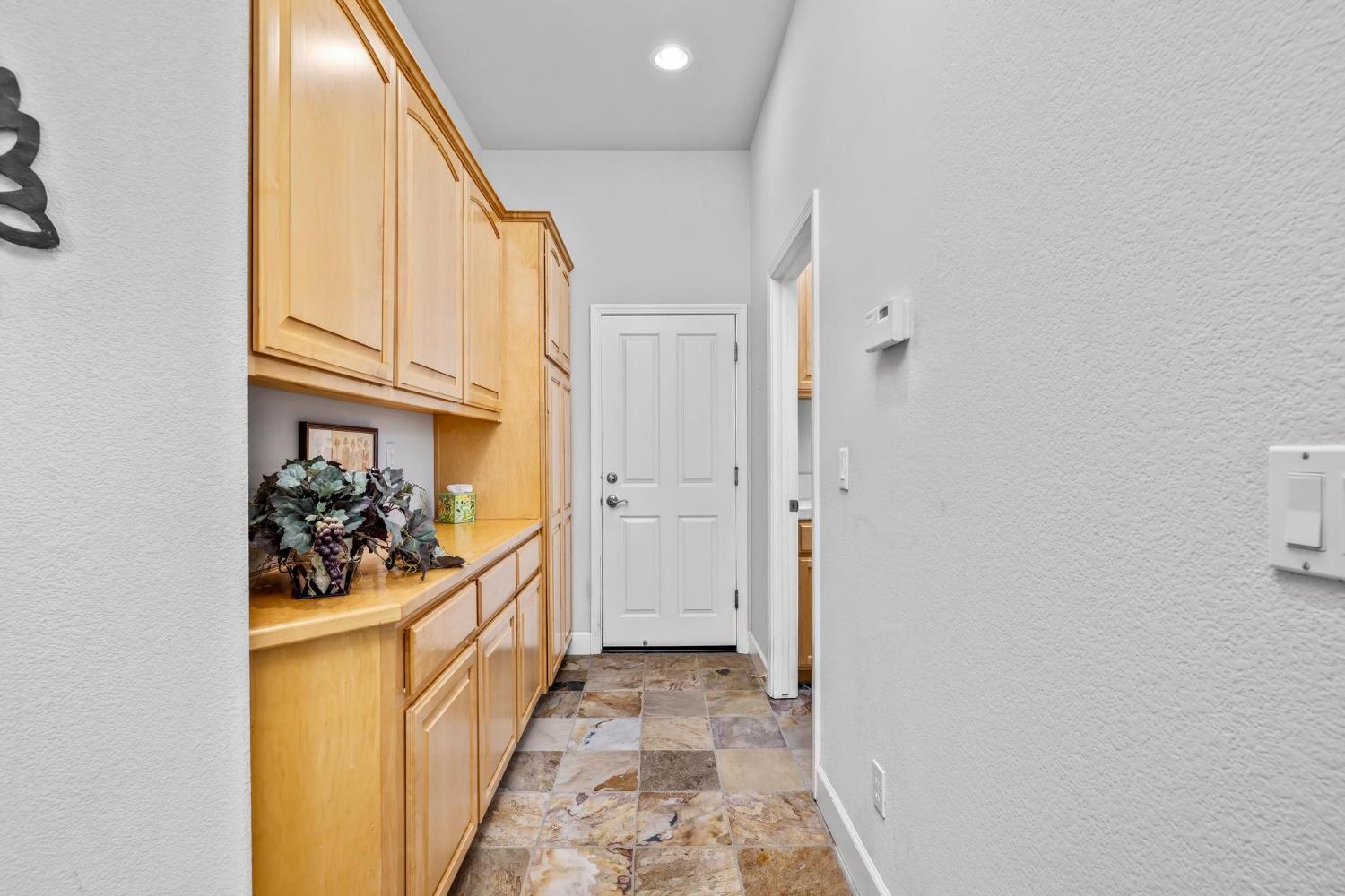 8 Rock Ridge Court, Unit 288 Copperopolis, CA 95228 - Photo 32 of 58 Extra storage cabinets in the hallway between bedrooms.