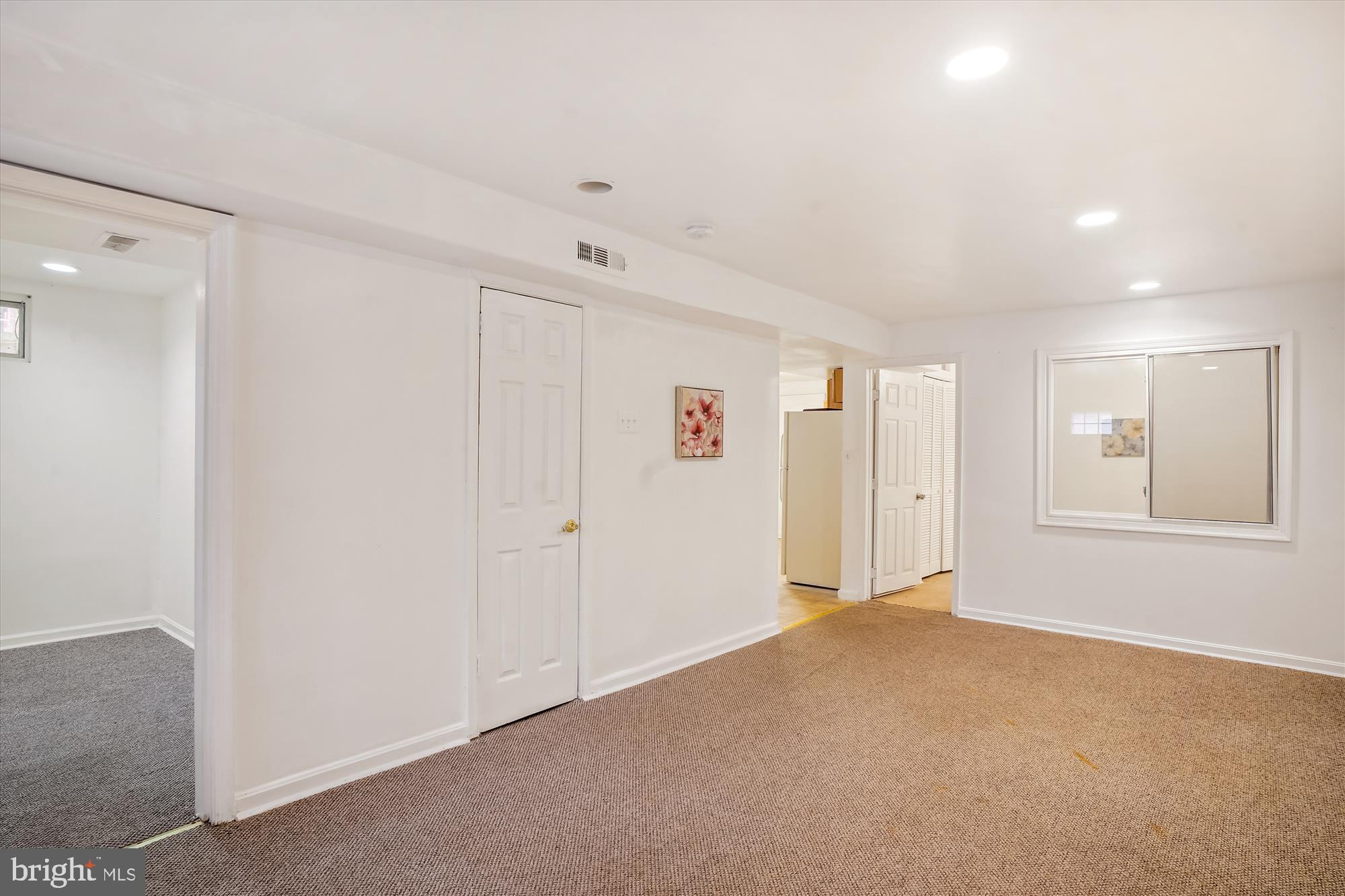 7404 Torran Rocks Way Gaithersburg, MD 20879 - Photo 32 of 41 lower living room area