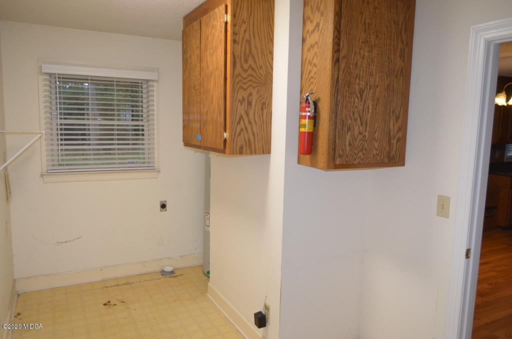 7690 Thomaston Road Macon, GA 31220 - Photo 14 of 28 a bathroom with a window and a shower
