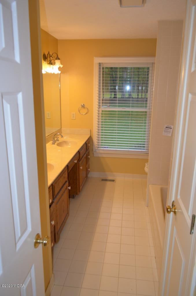 7690 Thomaston Road Macon, GA 31220 - Photo 22 of 28 a view of an empty room with a window