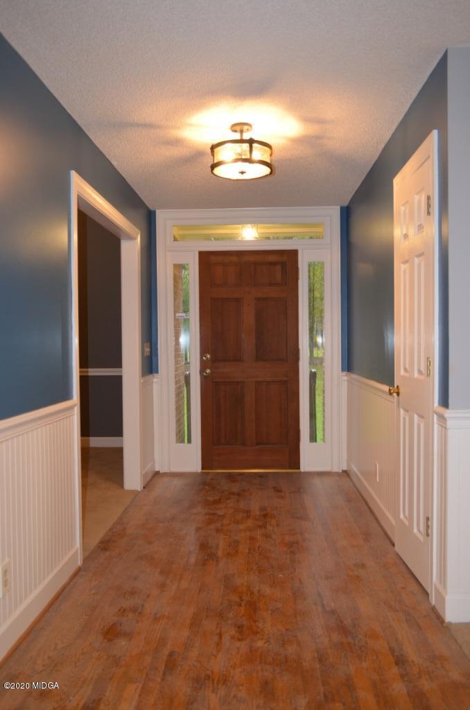 7690 Thomaston Road Macon, GA 31220 - Photo 5 of 28 a view of an empty room with a window
