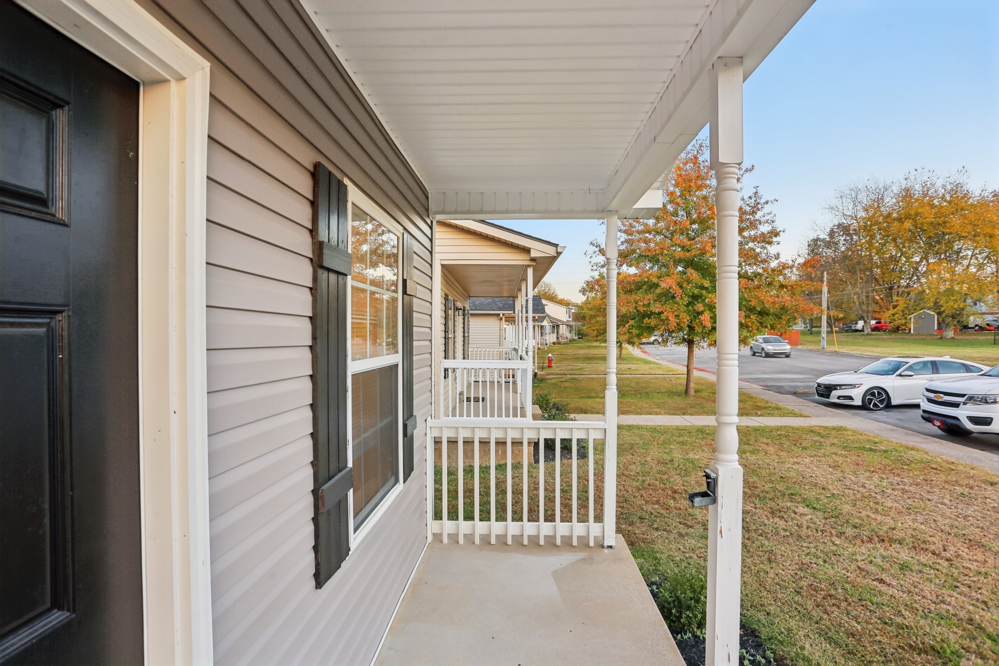 2607 Landrum Court Springfield, TN 37172 - Photo 8 of 37 a view of a porch with a floor to ceiling window and tree