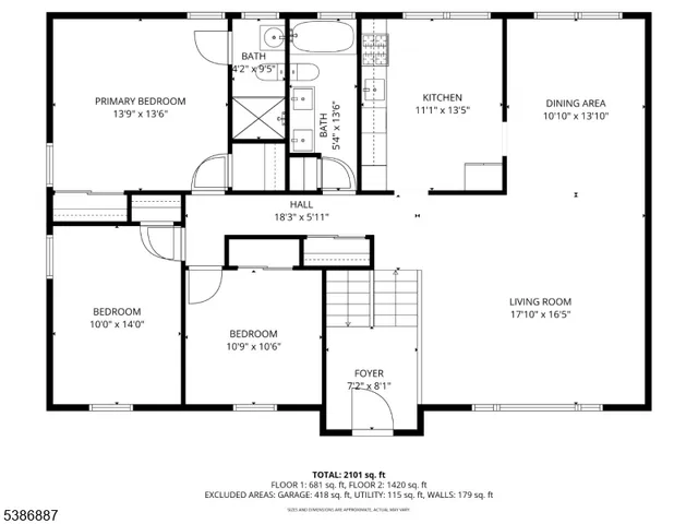 a backyard of a house with lots of plants and large trees